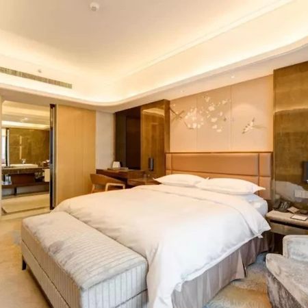 Li Cai Tian Qi Hotel Xianyang Экстерьер фото