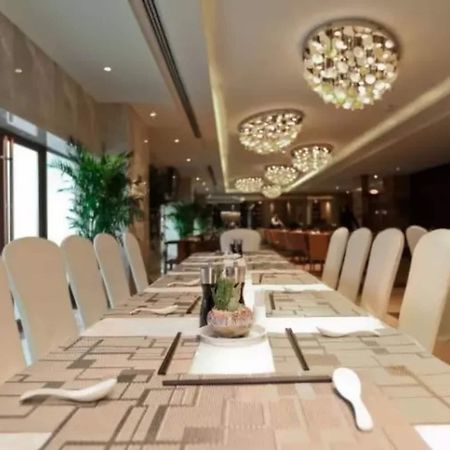 Li Cai Tian Qi Hotel Xianyang Экстерьер фото