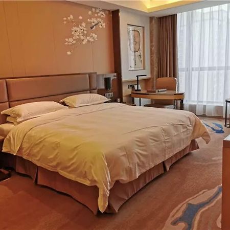 Li Cai Tian Qi Hotel Xianyang Экстерьер фото
