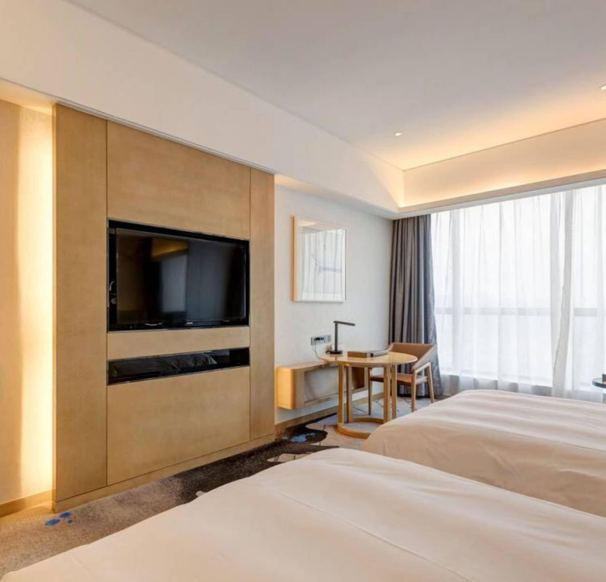 Li Cai Tian Qi Hotel Xianyang Экстерьер фото