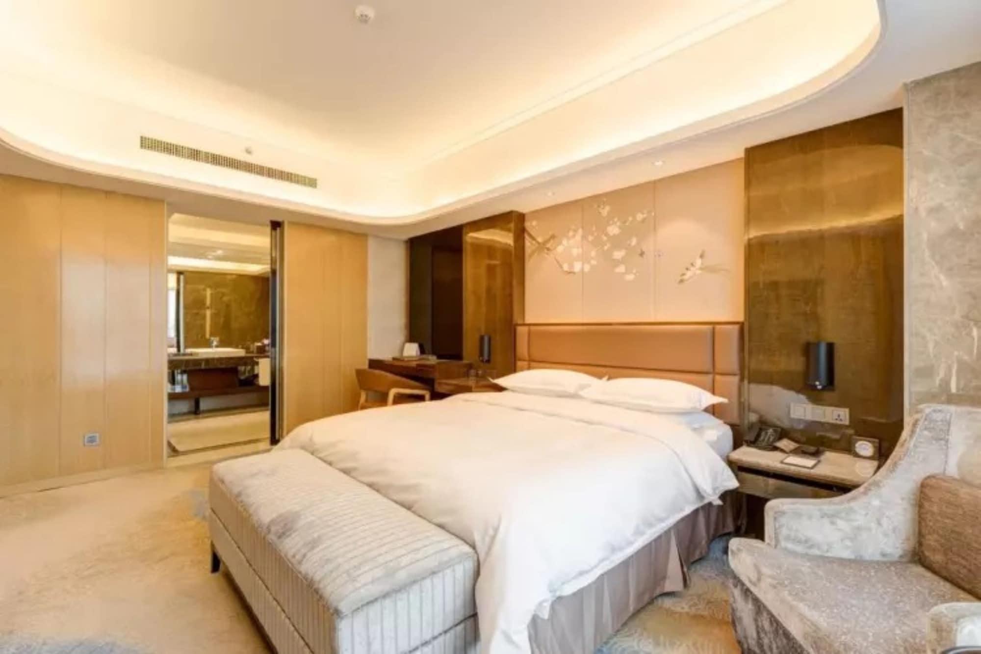 Li Cai Tian Qi Hotel Xianyang Экстерьер фото