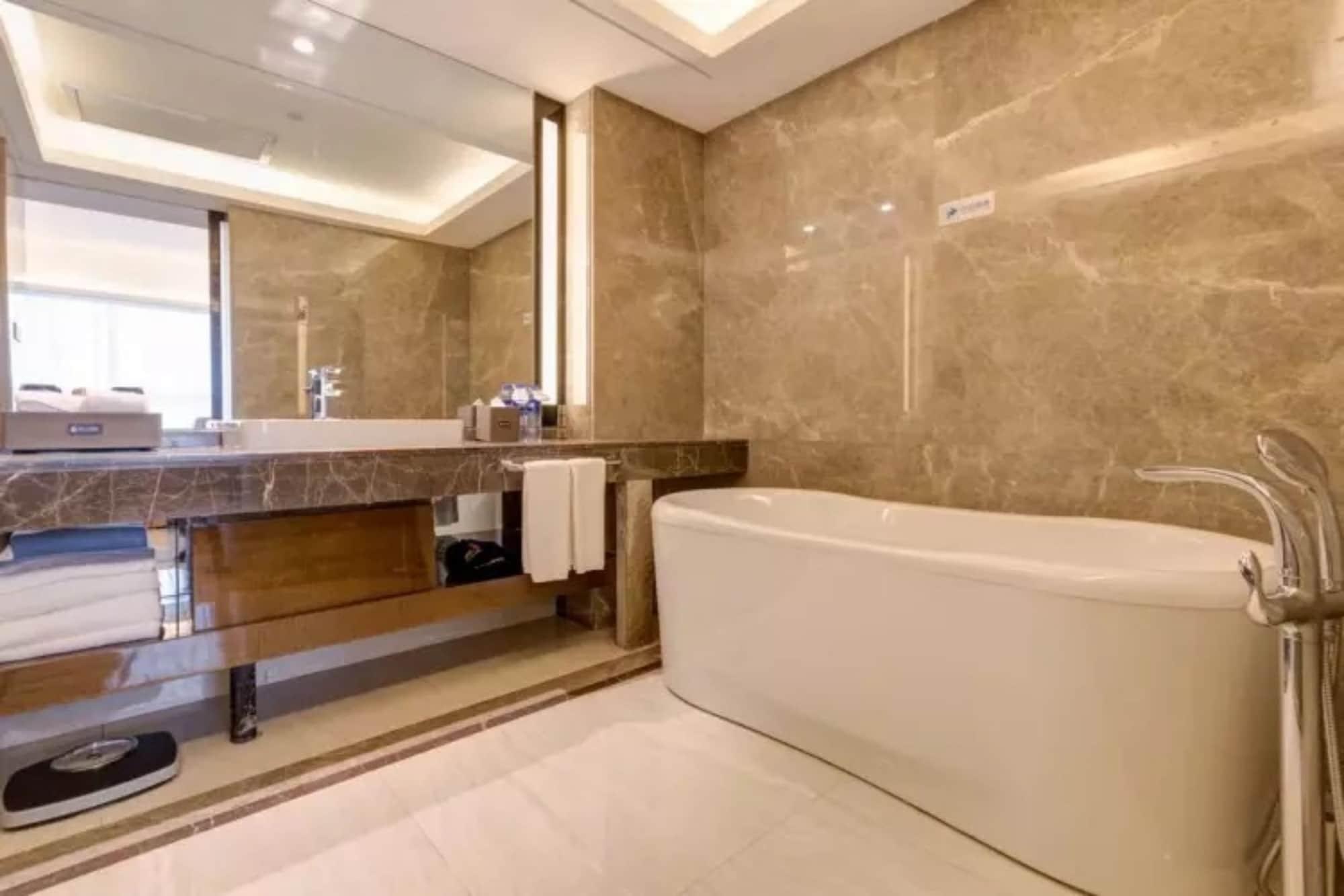 Li Cai Tian Qi Hotel Xianyang Экстерьер фото